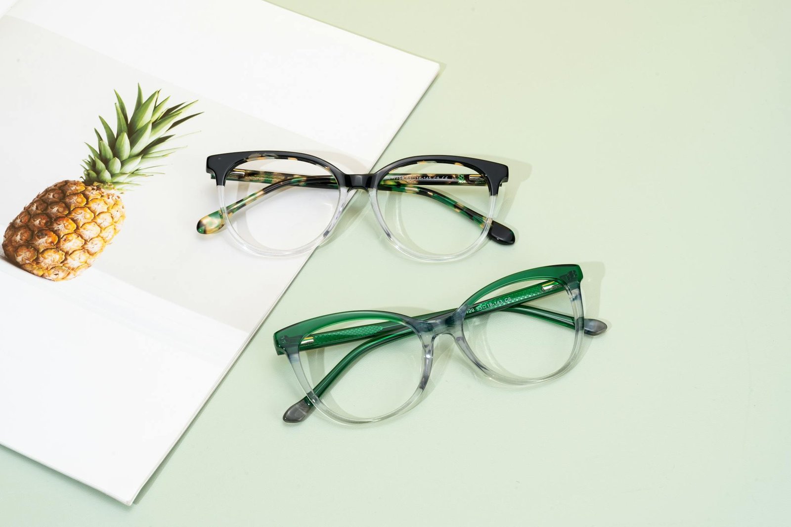 Minimalist eyeglasses photo with tropical styling and vibrant colors, perfect for fashion themes.